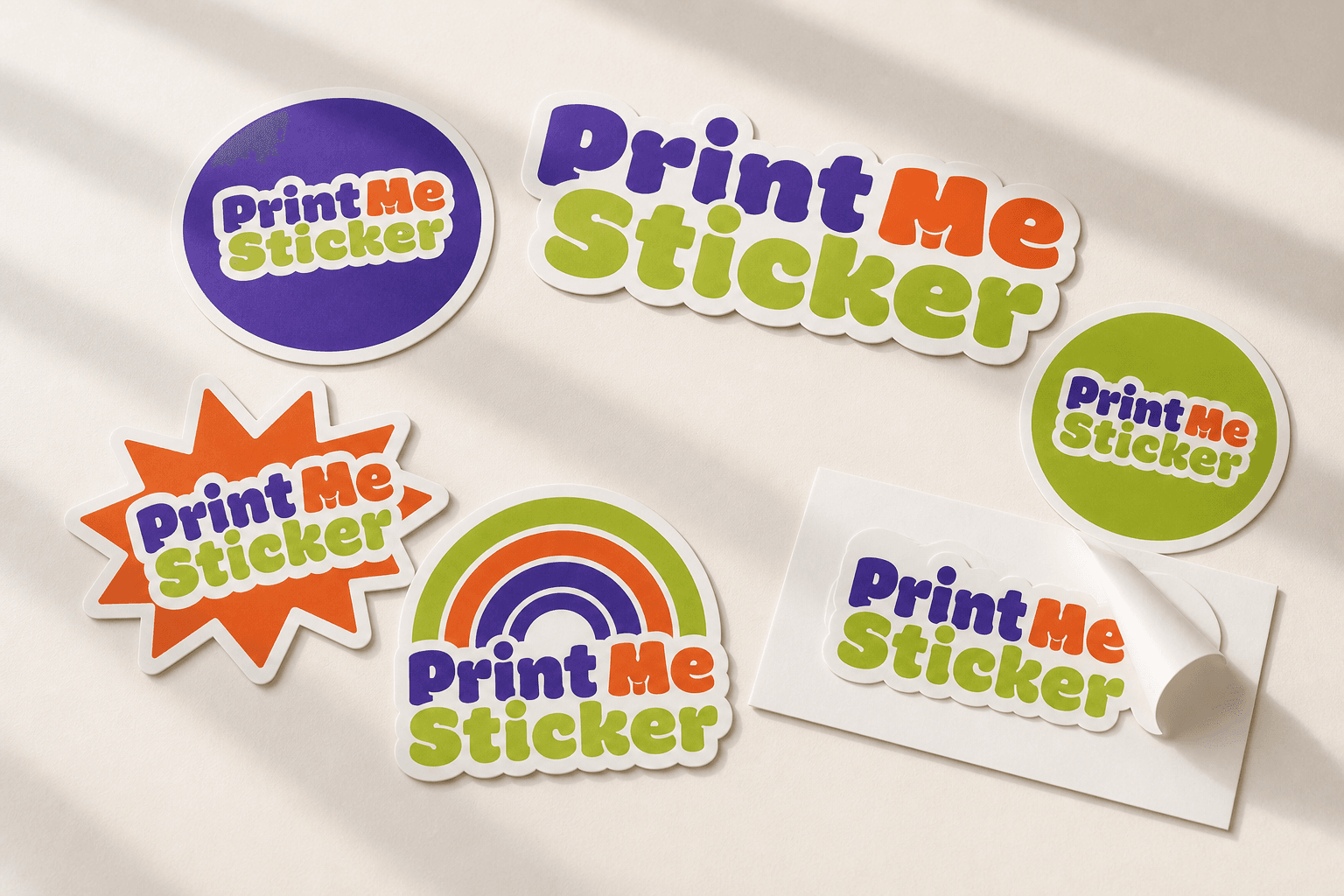 Realistic PrintMeSticker logo custom stickers shown on bottles, jars, product boxes, cups, and sticker sheets